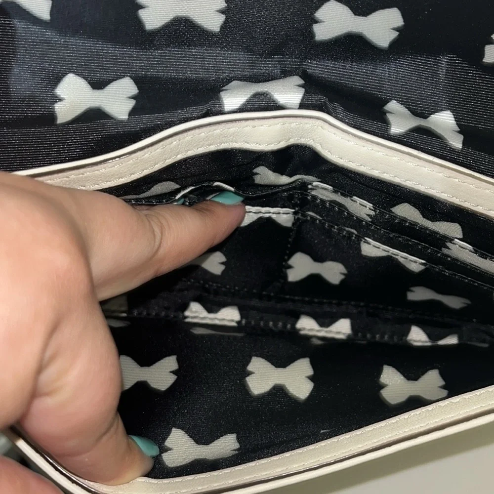 Kate Spade New York Cream Leather & Black Bow Tie Clutch